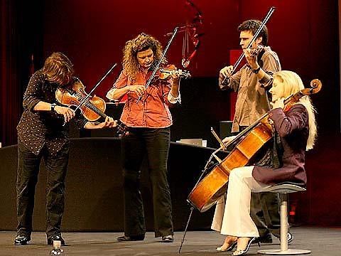 A string quartet plays "Blue Room"