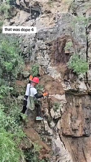 Clearing loose rocks on steep cliffs is far more dangerous than it looks. These workers hang over deep drops, secured only by ropes, to remove stones loosened by rain, weathering, and temperature changes. If left untouched, these rocks could fall at any moment, causing landslides or hitting passing cars and people. Using just ropes, hammers, and skill, they tap and pry each loose piece with precise control-too light and nothing moves, too strong and the slope could collapse. These silent cliff g