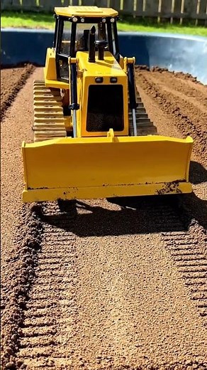 RC Bulldozer Action: Watch This Mini Machine Dominate the Dirt! 🚧