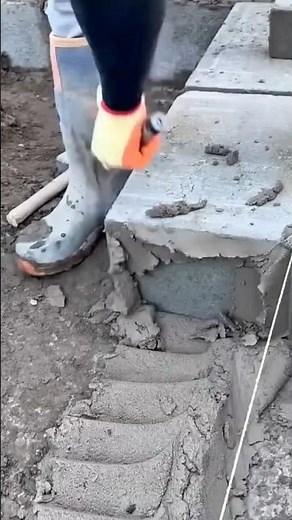 Laying concrete blocks precisely building strong foundations with care