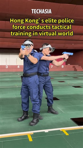 6.5K views · 26 reactions | Hong Kong’s Police Tactical Unit has adopted a mixed reality training system in which trainees use VR gear and simulation guns to coordinate hostage rescues in virtual scenarios. This approach cuts costs, lowers injury risks, and enhances tactical skills efficiently. | China Daily Hong Kong | Facebook