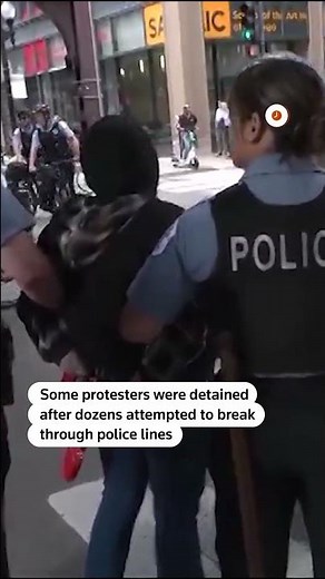 Anti-ICE protesters clash with police in the streets of Chicago | REUTERS