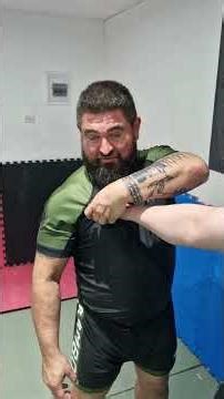 Simple self defence from chest grab wrist lock instructional #selfdefence #selfdefense