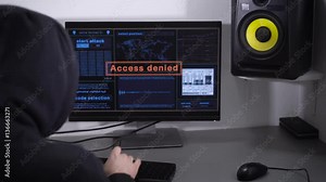 Hacker could not break into the server and he was very angry and hit to the keyboard by his fists. Successful cyber attack young IT professionals.