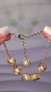 Luxury gold rubik’s cube pearl bracelet,do you like it? #beadedjewelry #handmadejewelry #jewelrydesign #diy #diyjewelry #handcrafted #beadedbracelets #diybracelet #bracelet #gifts #viralahorts #handmadebracelets #beading | Lara handcraft
