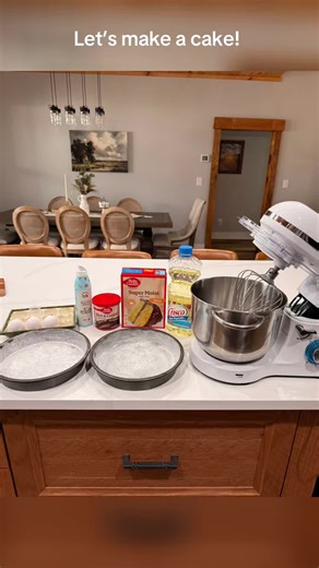 Directions for baking a “Betty Crocker” “Super Moist Yellow Cake Mix”: 1. Heat oven to 350° for aluminum or glass pan or 325° for a nonstick pan. Grease bottom only of 13“ x 9“ pan or bottom and sides of all other pans. 2. Mix cake mix, water, oil, and eggs in large bowl with mixer on medium speed or beat vigorously by hand two minutes. Pour in the pan. 3. Bake as directed in chart (28 minutes for two 8” round pans) or until toothpick inserted in center comes out clean. Cool 10 minutes before re