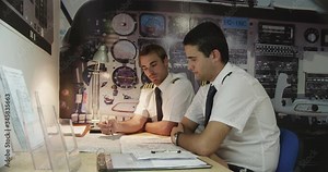 MS Instructor explaining aviation charts to student