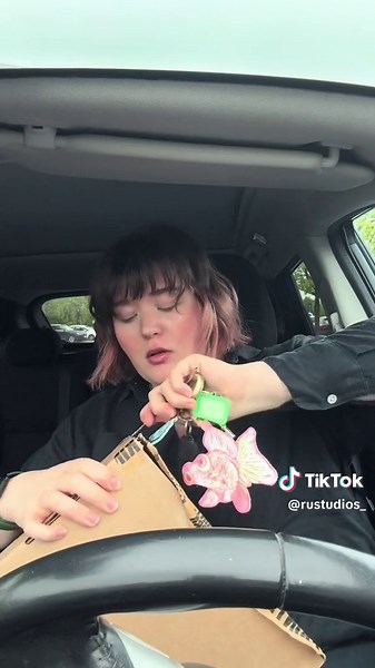 Open my art prints with me in the car! All prints available on my Etsy store Ru Design Studios 😁 #interiordesign #art #artprrints #artist #surfacedesign #artistsoftiktok #designer #pets