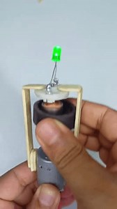 This video demonstrates a simple experiment showing how to generate electricity using a small motor and LED.