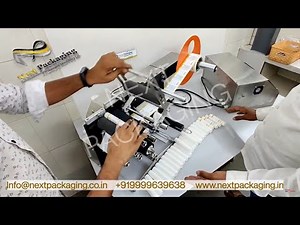 Face wash tube sticker labelling machine | Sticker label applicator on cream, scrub tubes