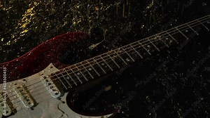 Wet red electric guitar falls on the surface of the water, illuminated by yellow light. Raindrops drum on wooden body and the strings of the instrument. Schot in a dark studio. Close up. Slow motion.