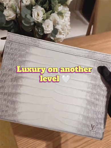 Discover the elegance of a Louis Vuitton Himalayan Crocodile leather clutch, crafted with rare exotic leather and a stunning gradient finish. A true collector’s luxury statement piece that defines exclusivity, craftsmanship, and timeless style. 🤍✨ #LouisVuitton #LuxuryBags #ExoticLeather #DesignerCollection #LuxuryLifestyle