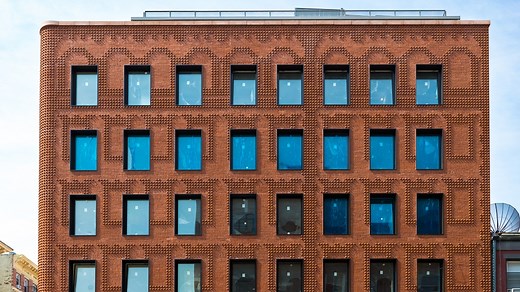 A Morse code-like pattern of domed brickwork by US brick company Glen-Gery was chosen for a mixed-used building in New York City designed by US architect Morris Adjmi. Grand Mulberry consists of seven storeys and is located in Manhattan's Little Italy neighbourhood. #architecture #newyork #PaidPartnership | Dezeen