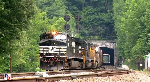 A Norfolk Southern mixed freight rolls through the Hemphill Tunnels and a loaded coal train led by a BNSF locomotive at "FARM" on the NS Pocahontas District. From the Highball Productions show "The Pokey Elkhorn Grade" https://rfd.video/PokeyElk | Railfan Depot