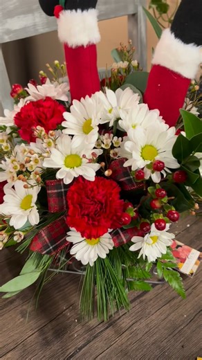 So many fun arrangements in the cooler ! #flowers #florist #flowershop #freshflowers #bravofloral #christmas | Bravo Floral