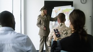 Woman with a map at the conference Free Stock Video Footage