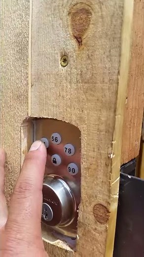 Electronic deadbolt on an outdoor walk gate and for added protection new steel posts set concrete.