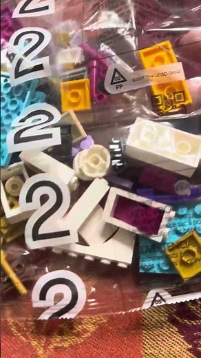 Here is a quick look of what the pieces look like inside LEGO Disney Princess The Little Mermaid - S