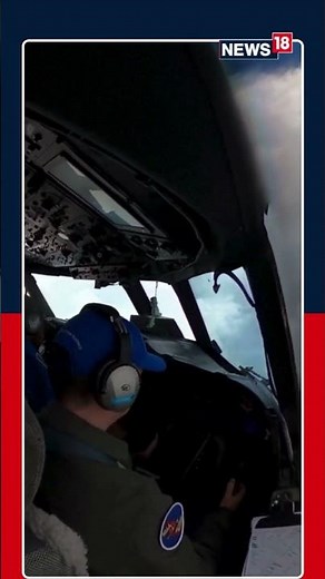 View From Inside U.S. Air Force Reserves C-130J Super Hercules plane looking up Hurricane Erin