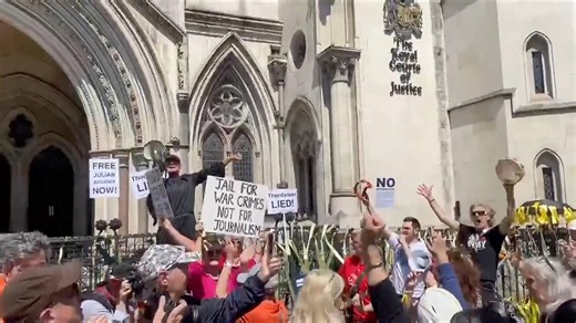 Assange supporters cheer after WikiLeaks founder wins right to appeal U.S. extradition