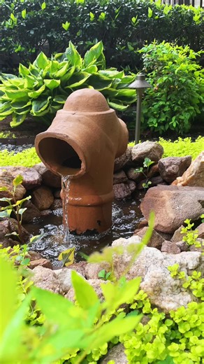 I created this fountain using a recirculating pump and an antique chimney cap. Video in my history showing construction. Bright green plant, Creeping Jenny. #gardenfountain #waterfeature #artfulrodger #diygardenfountain #atlanta #zenmoment