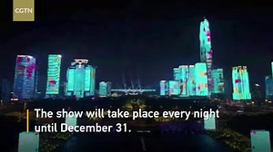 9.2K views · 676 reactions | A laser light show illuminated and animated the towering facade of many buildings in south China’s Shenzhen on Friday night to celebrate the 40th anniversary of China's reform and opening up. #ReformAndOpeningUp | CGTN | Facebook