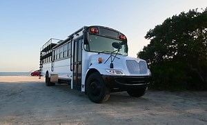 Camilia, the Skoolie, Is a Brightly Colored RV With Two Bathrooms and a Rooftop Deck