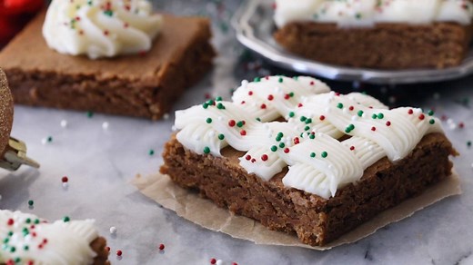 Soft and chewy Gingerbread Cookie Bars are decorated with a simple frosting and sprinkles! RECIPE: https://sugarspunrun.com/gingerbread-cookie-bars/ | Sugar Spun Run