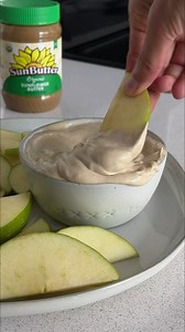 SunButter Yogurt Dip  Recipe by: Flora & Vino INGREDIENTS: 1 cup unsweetened almond milk yogurt (for a nut-free option, sub with yogurt of preference) 1/4 cup Organic SunButter 1 TBSP pure maple syrup (optional) 1/4 tsp ground cinnamon (optional) Apples, for serving Find the full recipe here: https://tinyurl.com/574h7pz7 | SunButter Sunflower Butter | Facebook