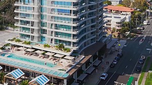 CHECK INTO SUMMER AT 'MILES AT KIRRA POINT 1406' Sleeps 4. Available Jan 7-13 & 18-23 Experience luxury redefined in this 14th-floor sub-penthouse on Kirra Beachfront. Enjoy breathtaking views from Cook Island to Surfers Paradise, relax by the 25m heated infinity pool, and unwind in a beautifully designed (2) bedroom, (2) bathroom apartment with alfresco dining and high-end finishes. With resort facilities including BBQ booths, a gym, and secure parking, this is the perfect setting for a special