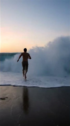Giant Wave Swallows Entire Beach