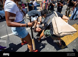 Los Angeles, California, USA. 3rd July, 2021. Protesters and counter-protester clash at the protest in support of transgender rights gather outside the Wi Spa in the Koreatown area of Los Angeles. Protesters gathered in support of the business after a viral video complained that they allowed a transgender woman in the spa. Credit: Jill Connelly/ZUMA Wire/Alamy Live News Stock Photo - Alamy