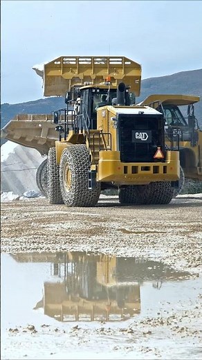 CAT 986K Loads Rocks into CAT 770 Dump Trucκ #shorts #construction #excavator