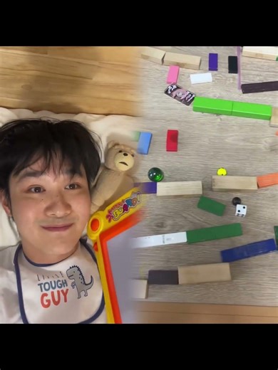 Baby draws on the magna doodle for the first time