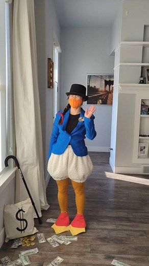Hello from Scrooge McDuck, the richest duck in the world! 💰 I've had this costume idea in my head for years and am so glad I finally got a chance to do it! It was fun having people figure out who I was and handing out chocolate coins and fake money at the annual Halloween party. Yes, that's very unlikely Scrooge, but it was more practical than having money trail me everywhere I went. I was surprised that only specific groups of people recognized me (usually millennials and geeks who introduced 