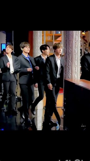 bts is walking like a Ramp walk in corridor