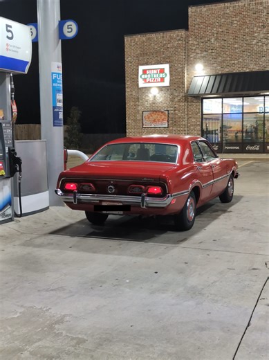 Discover the 1973 Mercury Comet in Candy Apple Red