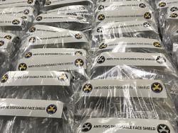 Correctional department producing disposable face shields