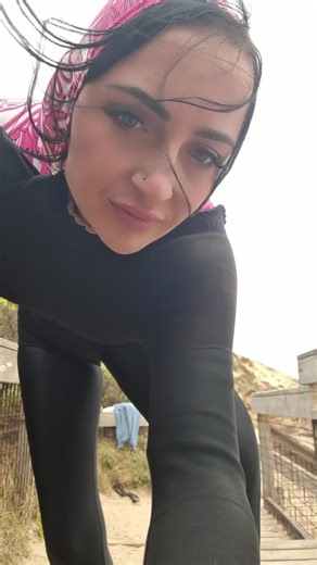 Trying on Multiple Swimsuits at the Beach