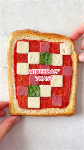 945K views · 832 reactions | Making Minecraft pizza toast - all you need is a small square cutter and whatever toppings you like - I went for cheese, salami and a little bit of basil. Spread your bread with tomato sauce, add your squares of topping and bake until golden and melted. A fun lunch or snack for all you Minecraft fans! #minecraftfood #minecraft #minecrafttoast #pizzatoast | The Fast Foodie | Facebook