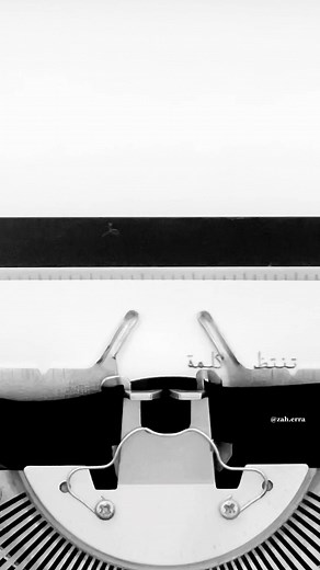 Close-Up View of Typewriter Mechanism in Action