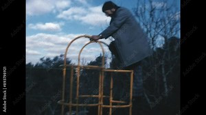 Monkey Man 1975 - A man climbs on playground equipment and acts like a monkey in 1975.
