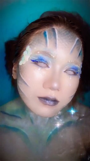 Hui ✿ on Instagram: "𝓦𝓱𝓲𝓼𝓹𝓮𝓻𝓼 𝓸𝓯 𝓽𝓱𝓮 𝓭𝓮𝓮𝓹, 𝓹𝓪𝓲𝓷𝓽𝓮𝓭 𝓲𝓷 𝓼𝓱𝓪𝓭𝓮𝓼 𝓸𝓯 𝓫𝓵𝓾𝓮. #halloween #hallowenmakeup #siren #sirenmakeup #trend #water #watertrend"