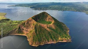 Aerial approaching shot of famous taal volcano at taal lake in Philippines, Batangas Province, South Manila,Tagaytay village.