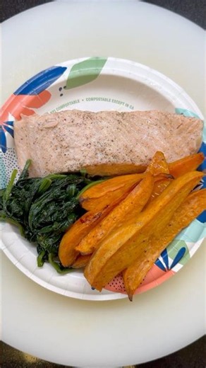 Pan-seared salmon with sautéed spinach & oven-baked sweet potato fries