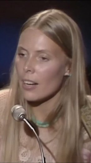 Free World Rock on Instagram: "Joni Mitchell – “Both Sides, Now” (Live, 1970) Recorded live for the BBC in London on 3 September, 1970. Joni Mitchell was inspired to write “Both Sides, Now” while reading Saul Bellow’s novel ‘Henderson the Rain King’ during a flight in 1966. Mitchell has explained that in the book, the main character Henderson is also on a plane, and looks out the window and down to see that he is above the clouds. While reading this, Mitchell also looked out the window of the pl