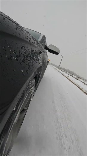 Audi A4 drifting in snow.