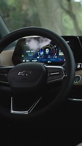 A total interior upgrade for the 2026 Equinox. Featuring a 11.0-inch diagonal driver cluster, 11.3-inch diagonal touchscreen, a new column shifter, and ACTIV-embossed headrests. | Car and Driver