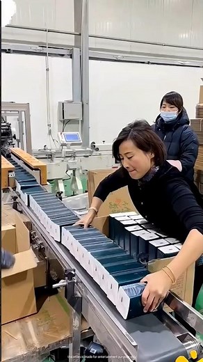 She teaches the new girl how to pack boxes