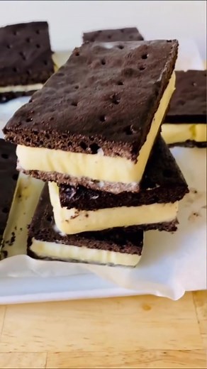 CLASSIC CHOCOLATE ICE CREAM SANDWICHES have never been eaiser: One-bowl and one-pan with a perfect yield and perfect texture from the freezer, all from perfectly little effort. Our summers are going to be even more amazing with these in them. // Chocolate Ice Cream Sandwiches on smittenkitchen.com or linked in profile. #onthisday